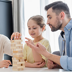 Black parents and Child Blocks Building Family Resilience